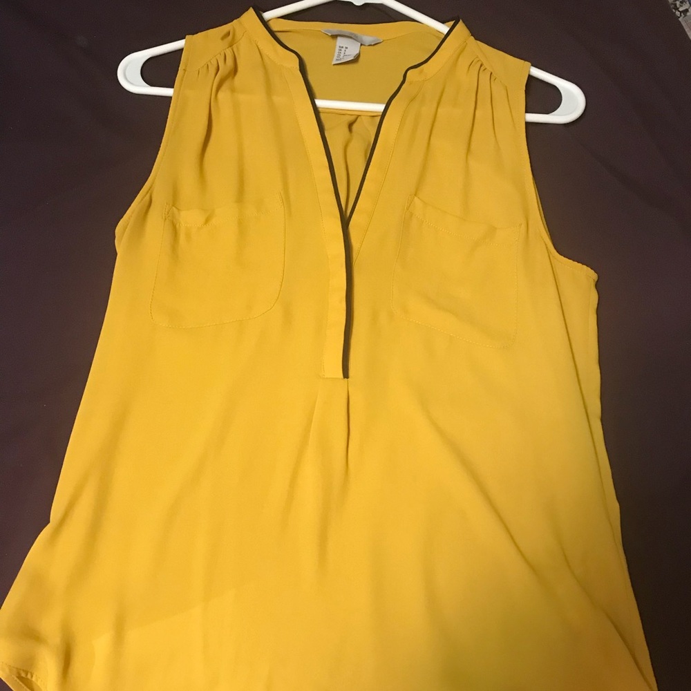 Yellow sleeveless blouse
